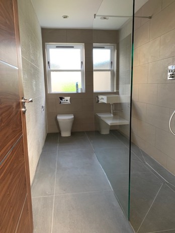 Completed wet room installation in Aberdeen with walk-in shower and glass screen