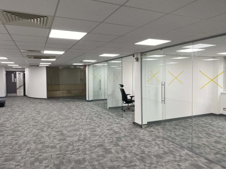 Glazed partitioning and new flooring completed as part of the Aberdeen office refurbishment