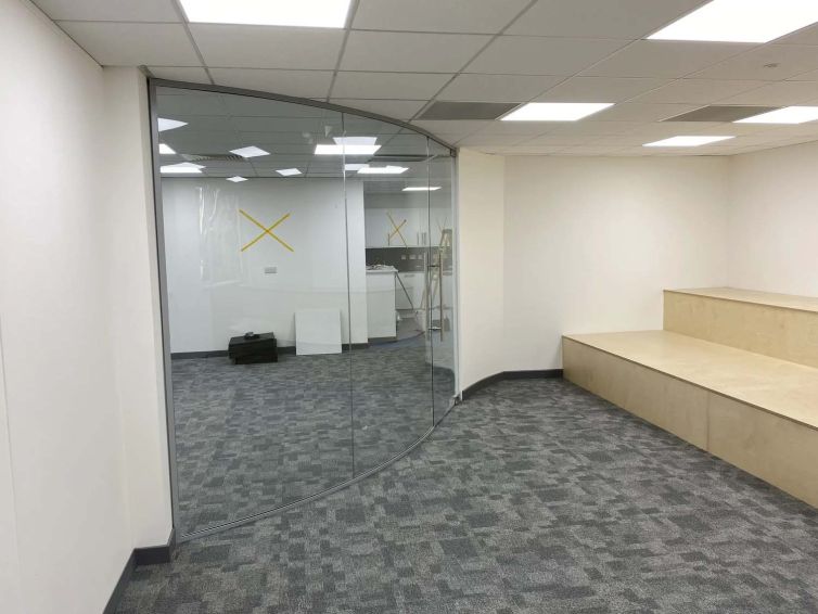Completed office refurbishment in Aberdeen with bespoke tiered seating and glazed partitions